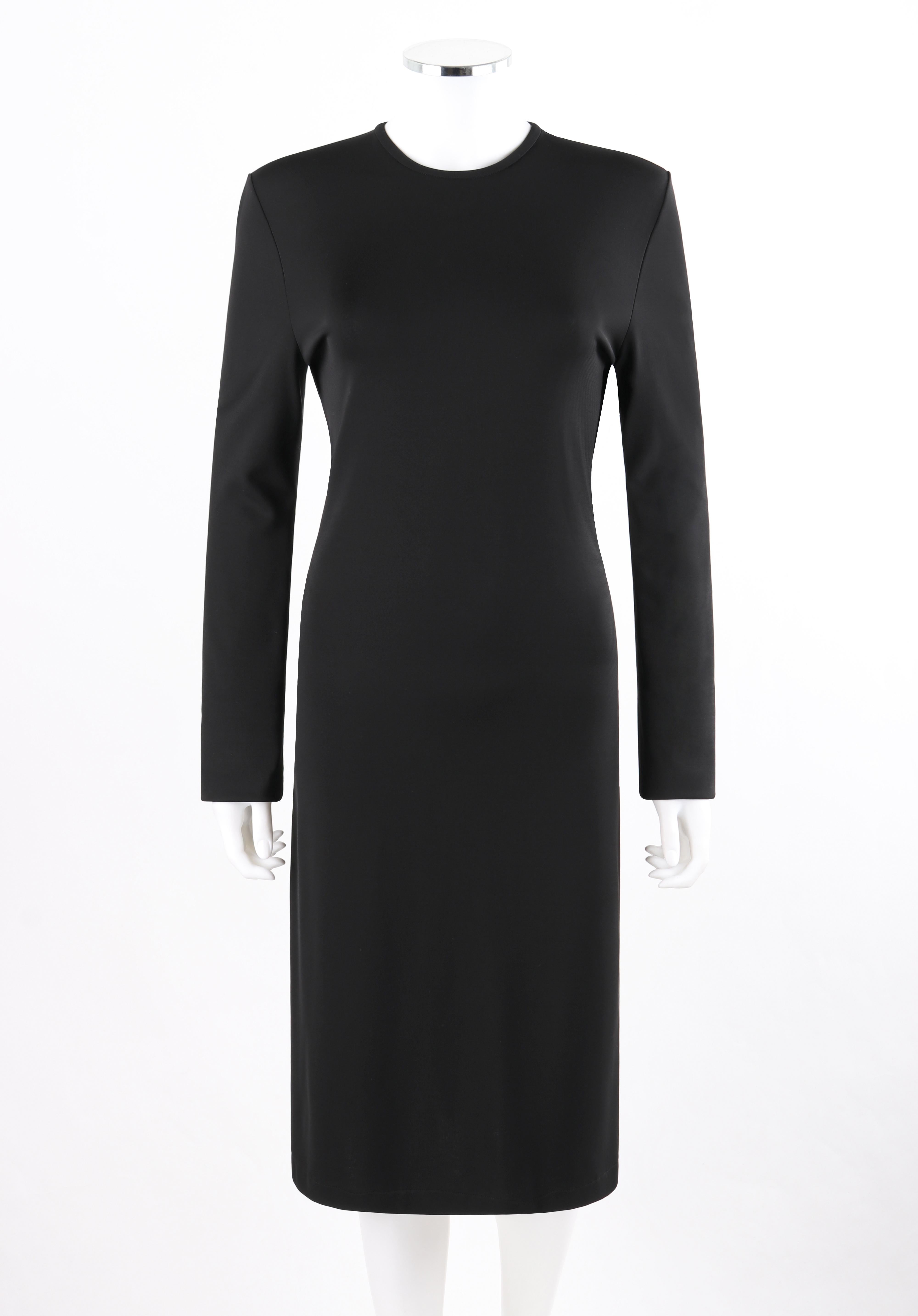 GIVENCHY Pre Fall 2013 Black Long Sleeve Ruffle Detail Knit Sheath Dress NWT

Brand / Manufacturer: Givenchy
Collection: Pre Fall 2013
Designer: Riccardo Tisci
Manufacturer Style Name: “Robe”
Style: Sheath dress
Color(s): Black
Lined: No
Marked