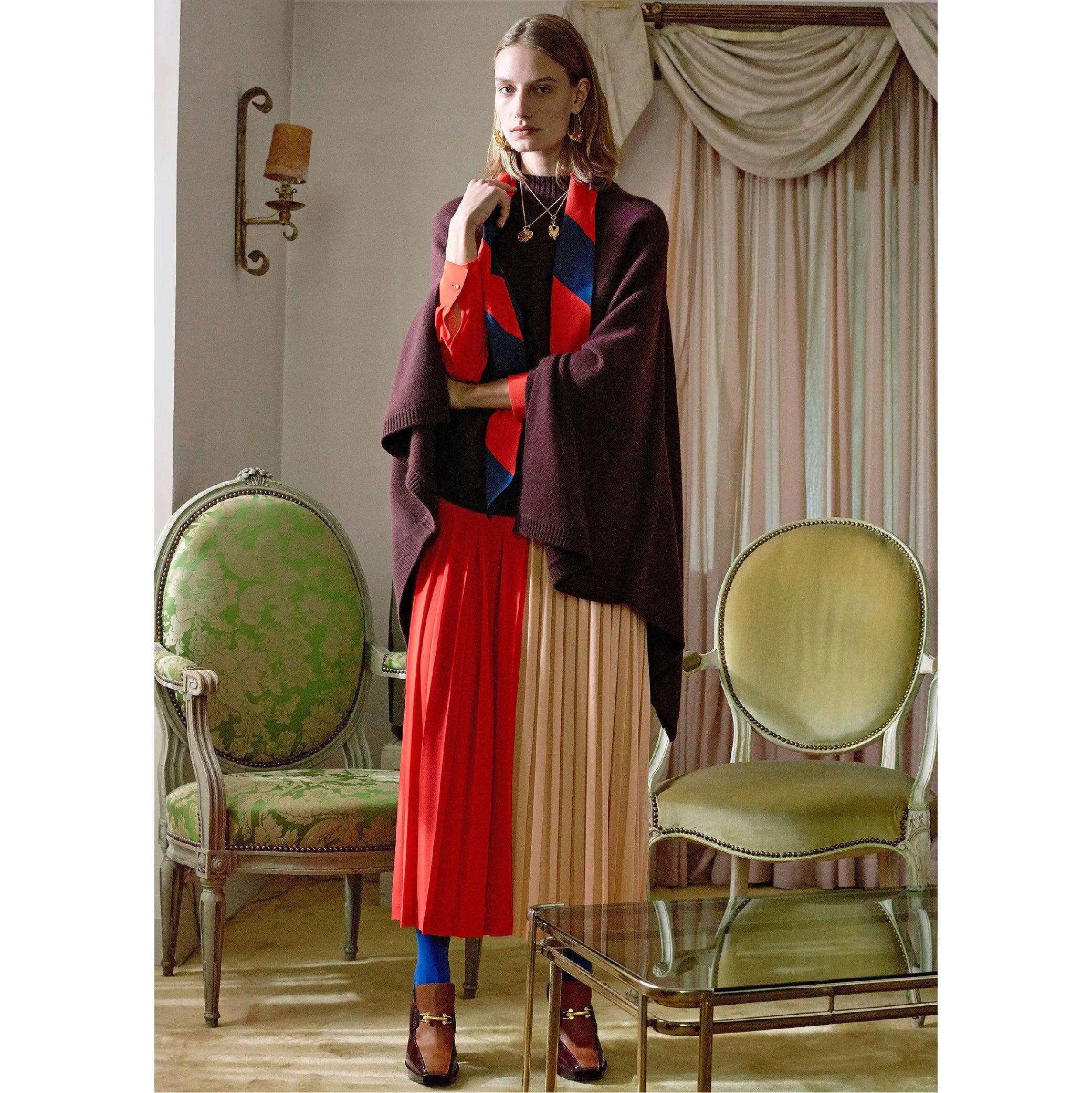 GIVENCHY Pre-Fall 2018 midi skirt by Clare Waight Keller comes in a red & pink two-toned viscose / polyester with a leather waistband featuring a pleated design, mid-length, and a side zipper closure. Made in Italy.
Excellent Pre-Owned Condition.