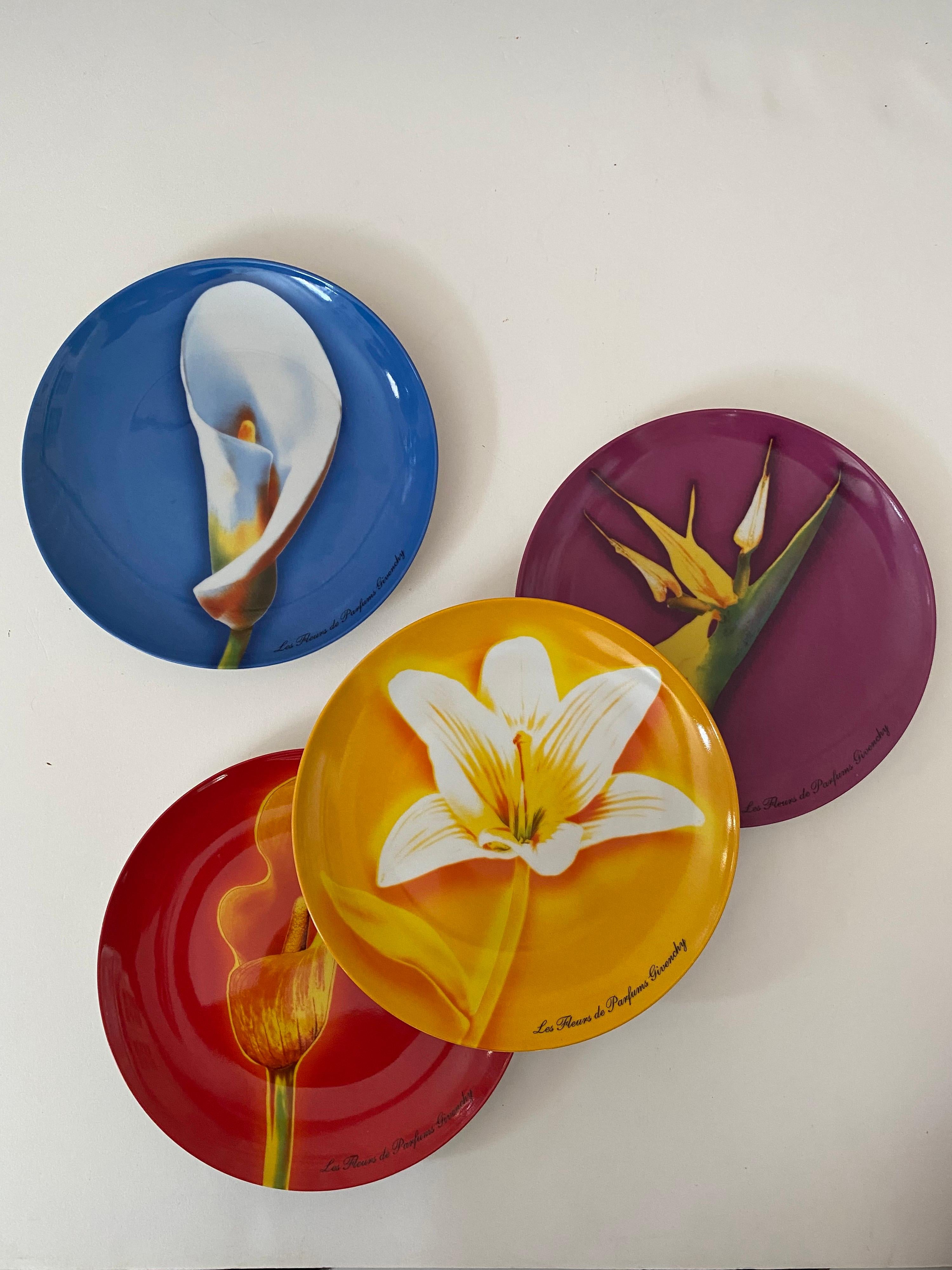 A set of four (4) dessert plates designed by Givenchy.

Fine porcelain with hand painted rare flowers.

Signed.

Circa 2000.

Dimensions: 8-1/4 inches wide x 1 inch high.

  