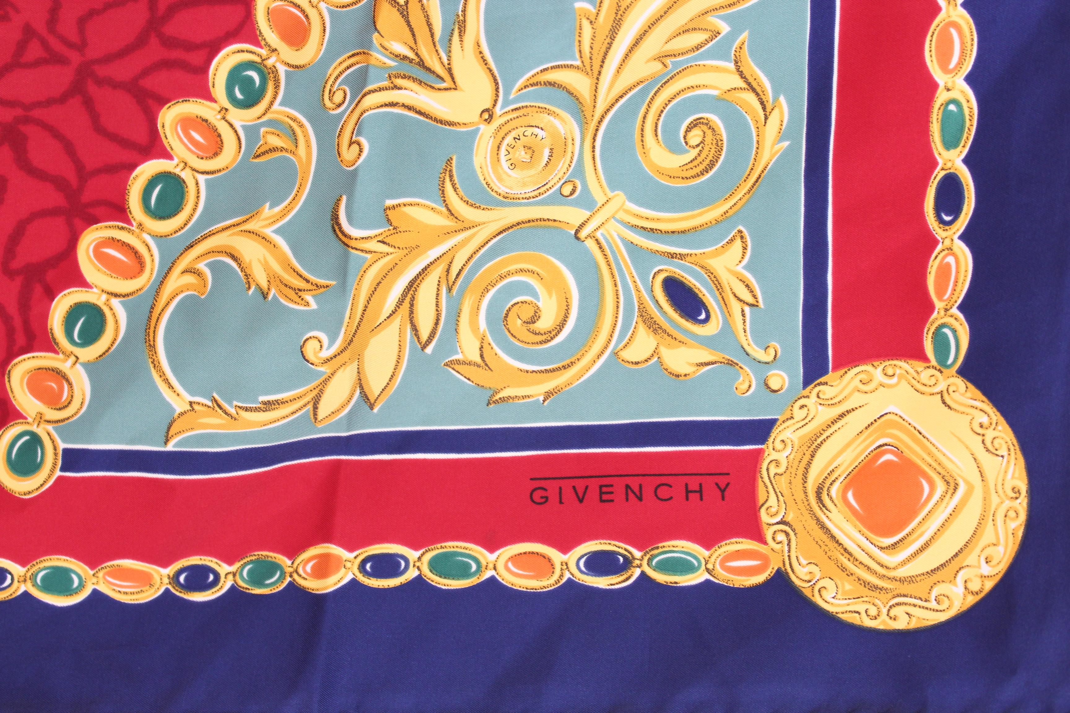 Givenchy vintage 90s foulard. Red, gold and blue color with baroque style designs. 100% silk. Made in Italy. Very good vintage condition, there is a small spot.

Measures: 88 x 88 cm


