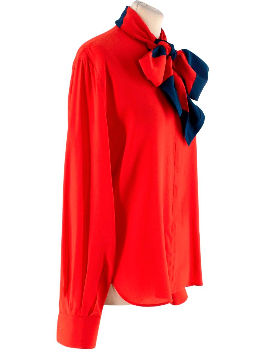  Givenchy Red Button-Front Silk Blouse with Striped Detachable Scarf. 

- Circa AW19
- Crafted from light-weight silk
- Smart slim fitting silhouette 
- Buttons lining in the front and cuffs
- Detachable red & navy striped scarf 
- Comes with one