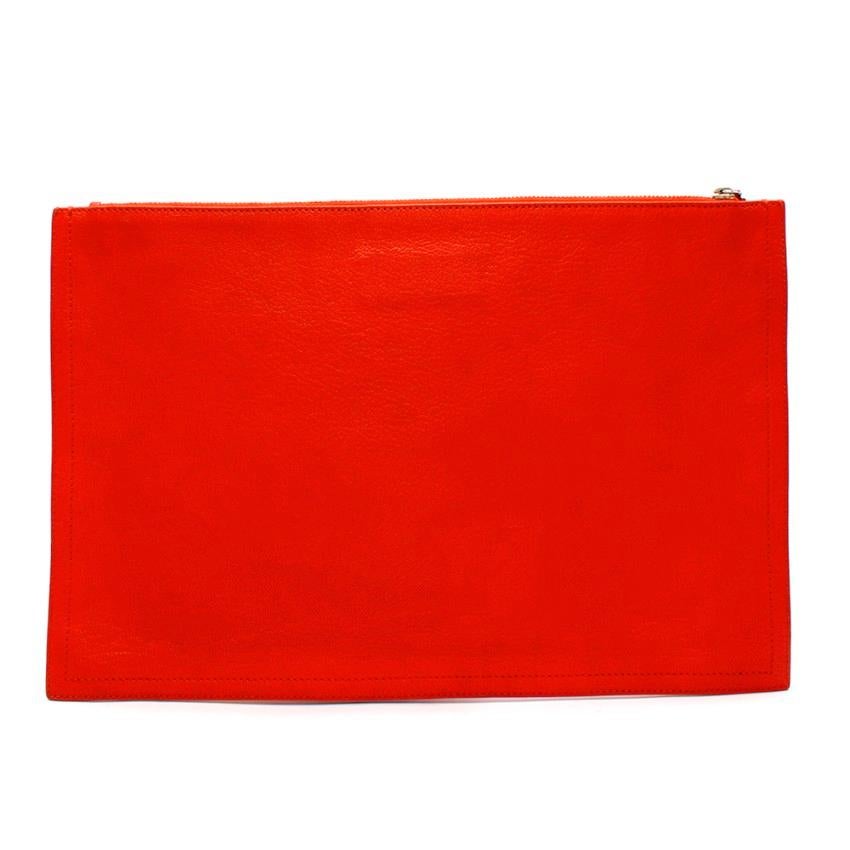Givenchy Red Goat Skin Pouch 

- Red textured goat skin leather 
- Silver shiny zip hardware
- Givenchy silver logo on the front of the pouch
- May be used for a laptop case or clutch
- Red top stitching
- Slight glossy finish 
- Canvas inner