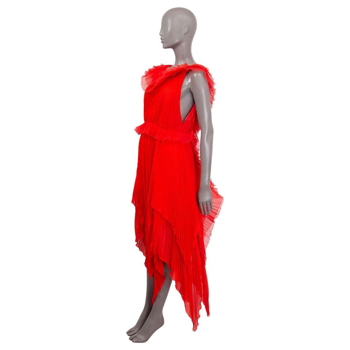 100% authentic Givenchy Spring/Summer 2018 pleated dress in cherry red silk-georgette (100%). Features ruffled details, a asymmetrical hemline and a deep v-shaped back. Opens with a concealed zipper and a hook at the back. Lined in cherry red silk