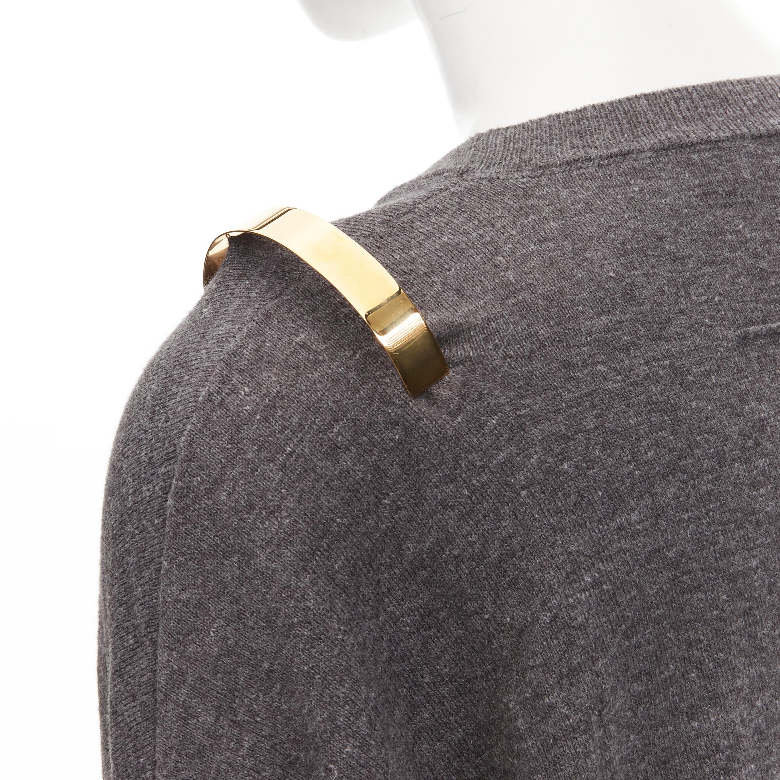 GIVENCHY Riccardo Tisci gold metal shoulder bar cuff grey wool alpaca sweater S
Reference: YNWG/A00150
Brand: Givenchy
Designer: Riccardo Tisci
Material: Wool, Alpaca, Cotton
Color: Grey, Gold
Pattern: Solid
Closure: Pullover
Made in: