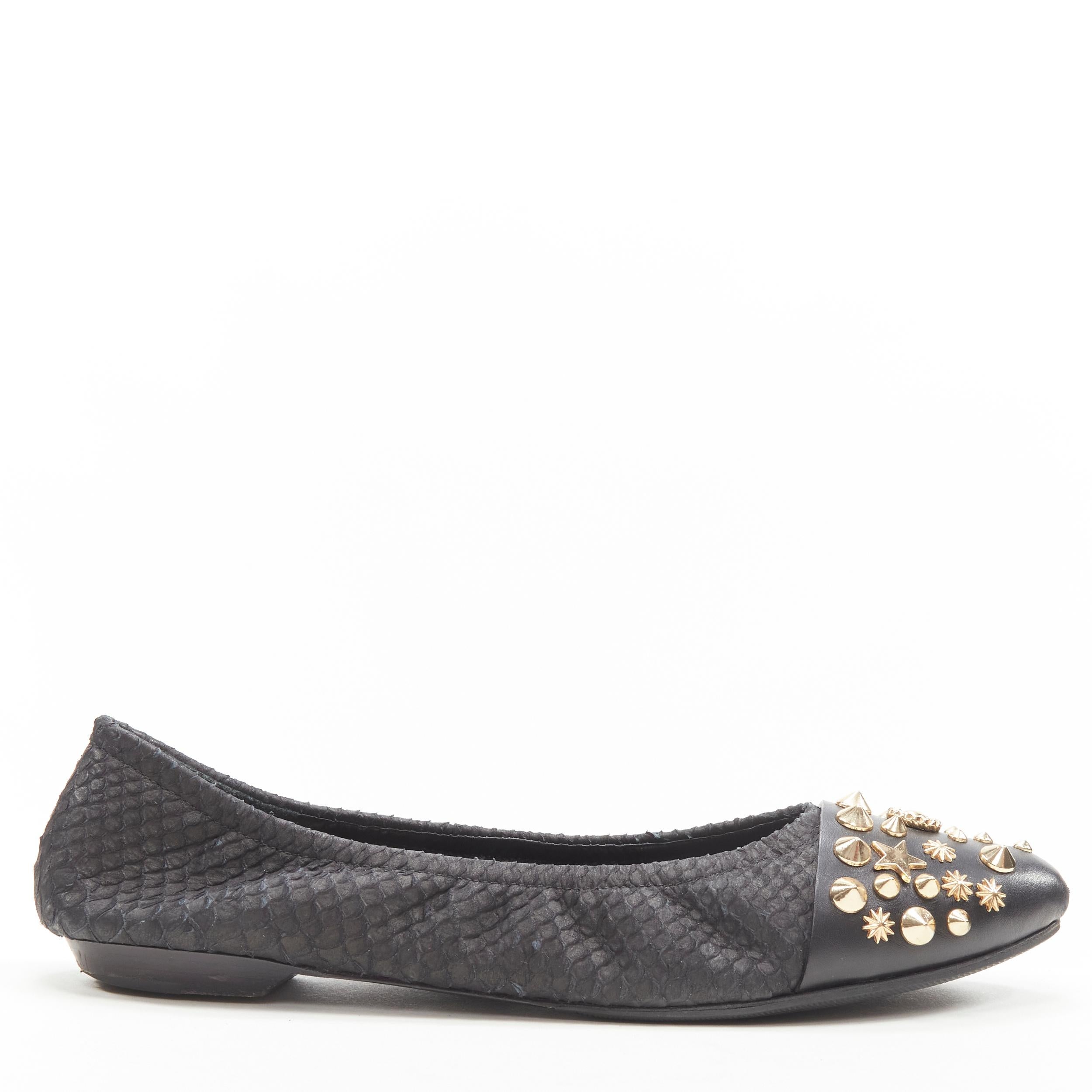 GIVENCHY Riccardo Tisci gold star spike stud toe cap scaled ballerina flats EU37 
Reference: ANWU/A00172 
Brand: Givenchy 
Designer: Riccardo Tisci
Material: Leather 
Color: Black 
Pattern: Scaled 
Extra Detail: Gold-tone hardware. Soft scaled