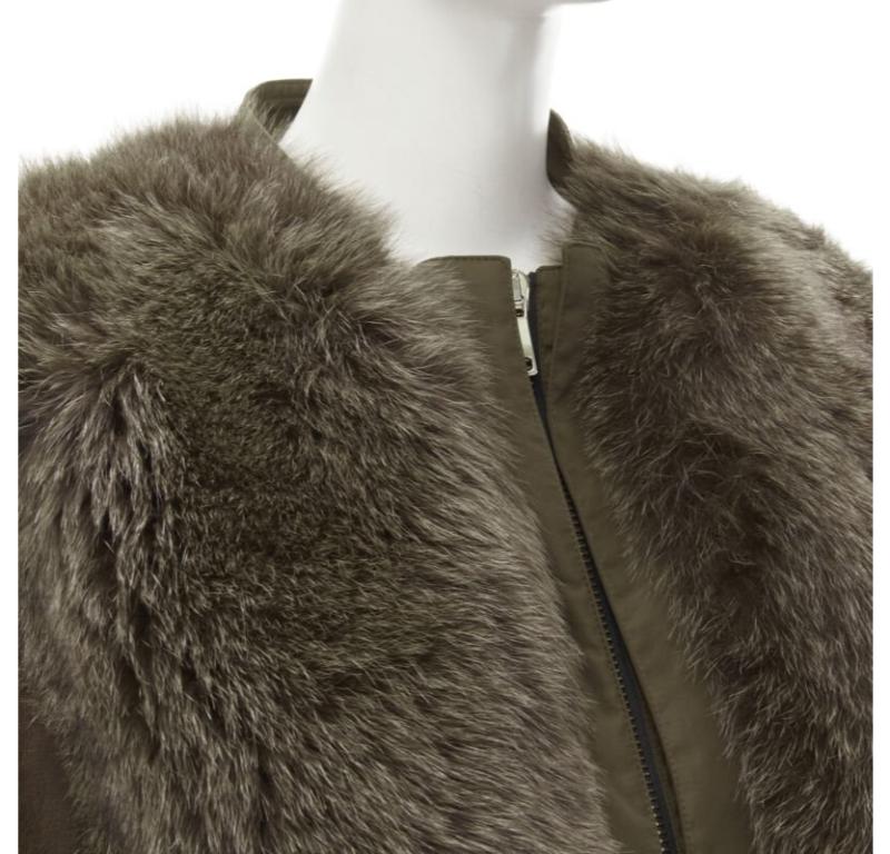 GIVENCHY Riccardo Tisci green leather sleeve fox fur anorak coat FR34 XS
Reference: JACG/A00051
Brand: Givenchy
Designer: Riccardo Tisci
Material: Polyamide, Leather
Color: Green, Brown
Pattern: Solid
Closure: Zip
Extra Details: Fox fur panel at