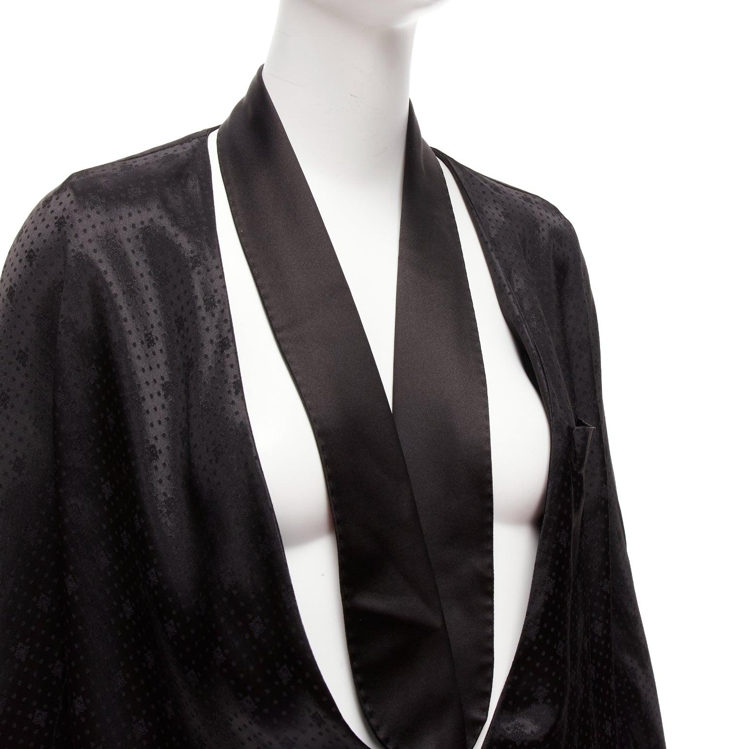 GIVENCHY Riccardo Tisci viscose black cut out collar robe blazer FR38 M
Reference: KEDG/A00326
Brand: Givenchy
Designer: Riccardo Tisci
Material: Viscose, Blend
Color: Black
Pattern: Barocco
Closure: Magnet
Lining: Black Fabric
Extra Details: Cross