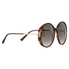 Gafas de sol redondas y oversize de Givenchy en acetato marrón