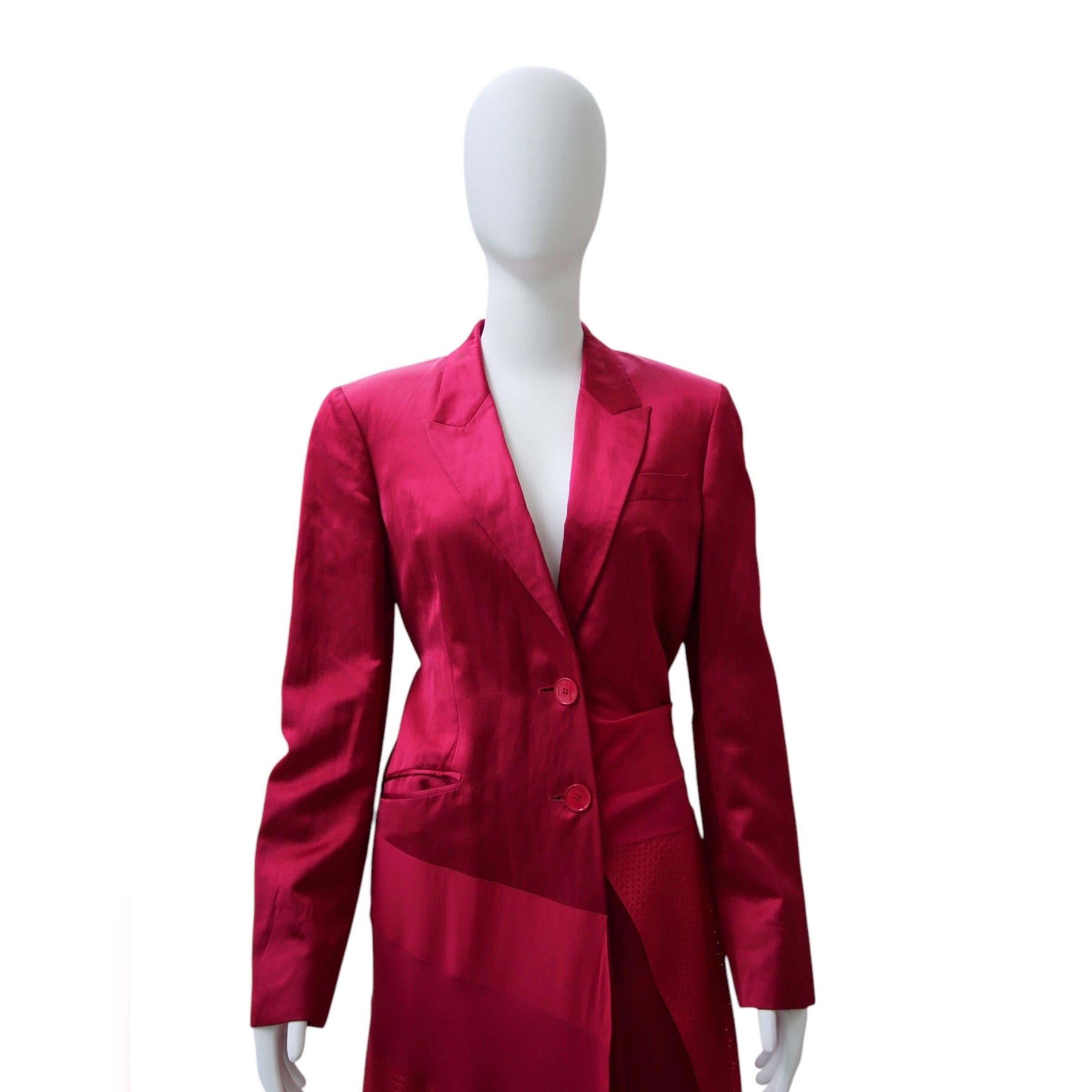 Givenchy Fuchsia Blazer/Dress

This striking fuchsia Givenchy blazer dress is a bold fusion of tailored sophistication and feminine flair. Designed with sharp lapels and structured shoulders, it features an asymmetric layered skirt with pleated
