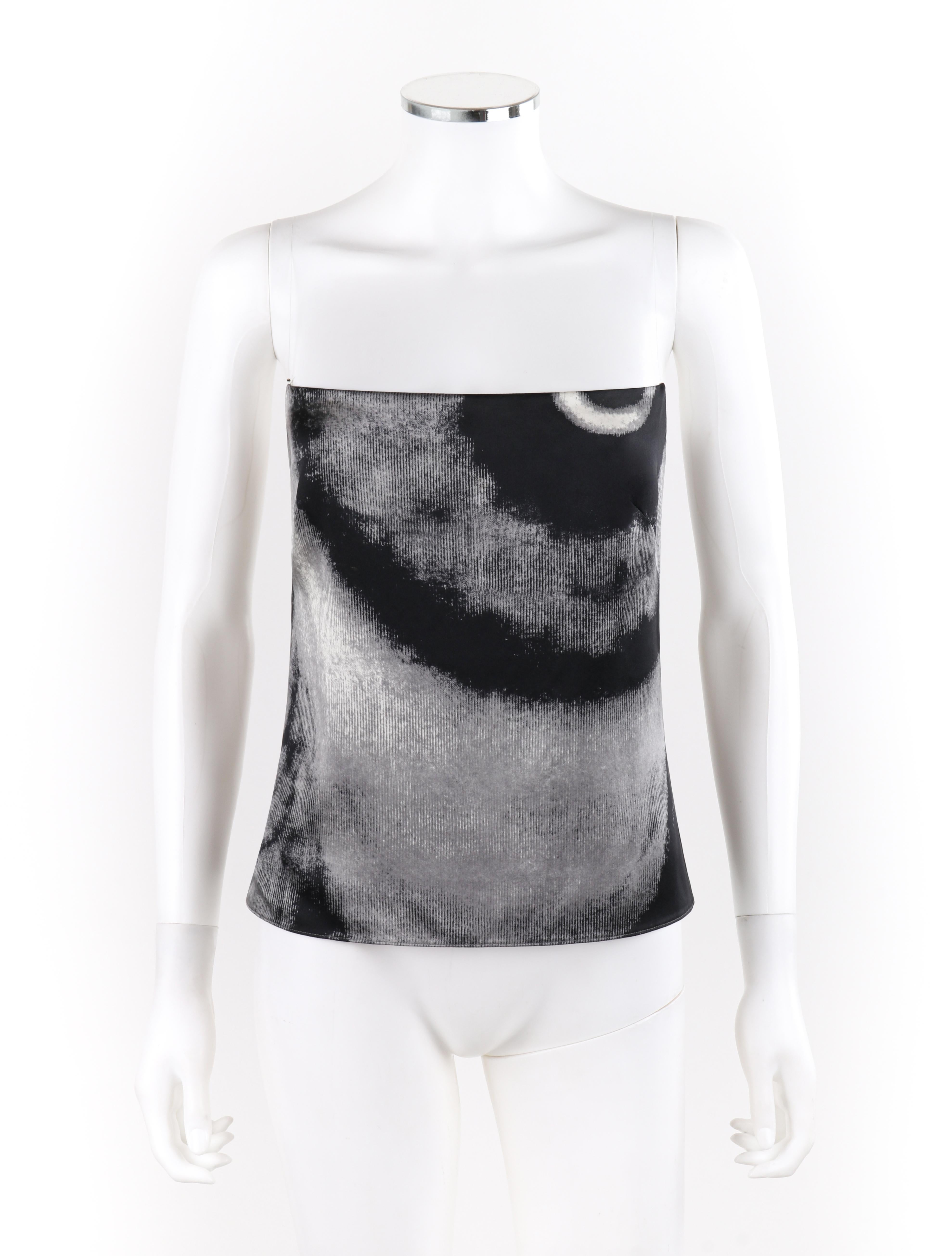 GIVENCHY S/S 1999 ALEXANDER McQUEEN Black White Abstract Eye Illusion Tank Top
 
Brand / Manufacturer: Givenchy
Collection: S/S 1999
Style: Tank top
Color(s): Shades of black, white, and grey
Lined: Yes
Marked Fabric Content: 100% silk  
Additional