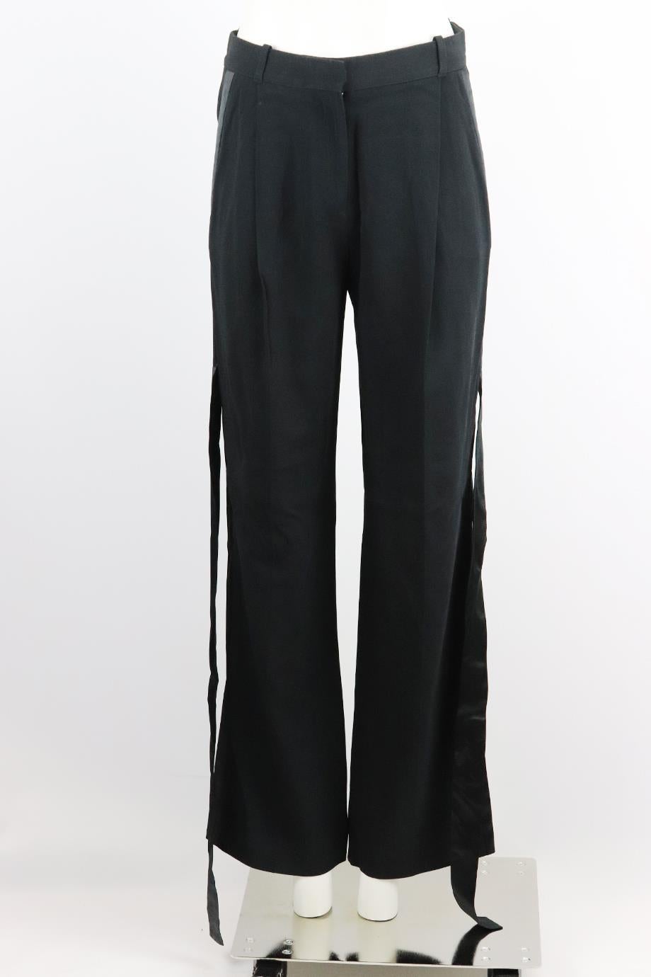 Givenchy satin trimmed woven wide leg pants. Black. Hook and zip fastening at front. 95% Viscose, 5% elastane; fabric2: 100% silk; fabric3: 71% acetate, 29% silk; waistband: 64% cotton, 19% polyester, 13% moda, 4% polyamide. Size FR 34 (UK 6, US 2,
