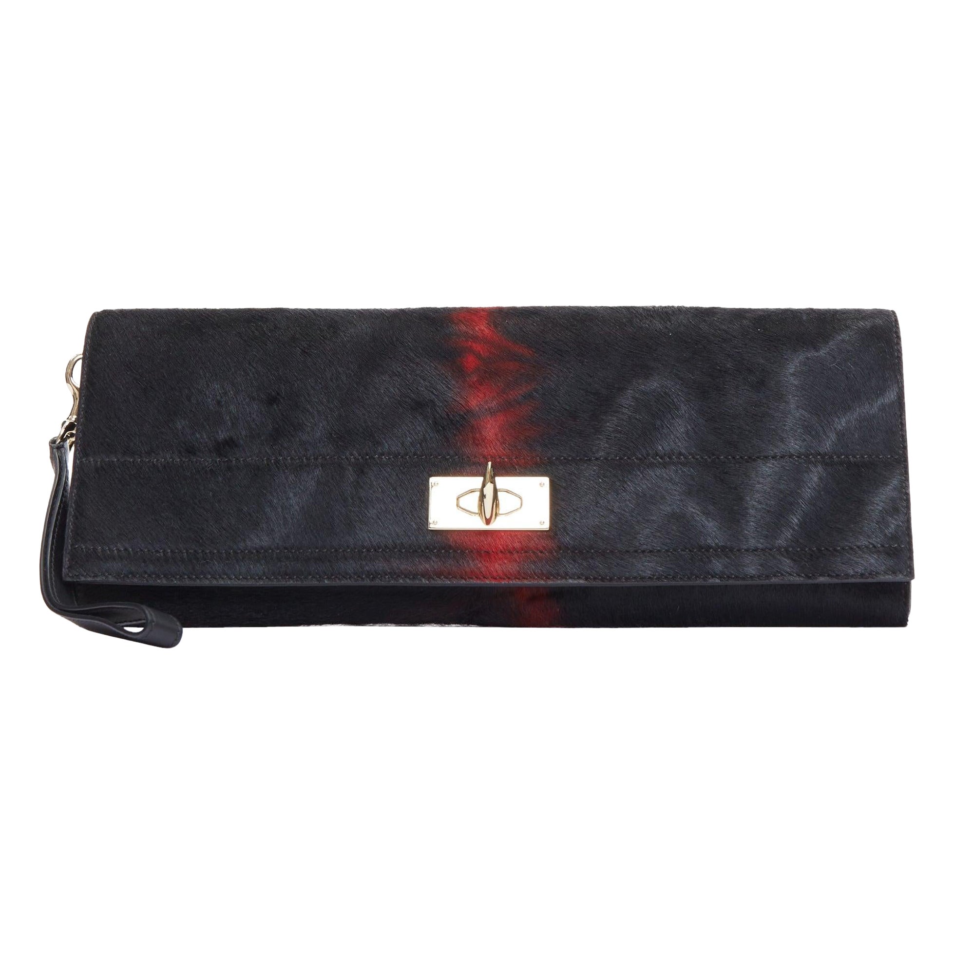 Bolso de mano plegable GIVENCHY Shark negro rojo ponyhair dorado con cierre giratorio en venta