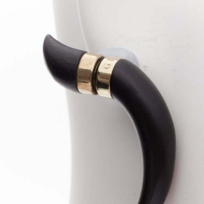 GIVENCHY Shark Tooth black silver magnet horn earring Single
Reference: BSHW/A00109
Brand: Givenchy
Designer: Riccardo Tisci
Model: Shark Tooth earring
Material: Plastic
Color: Black, Silver
Pattern: Solid
Closure: Magic Tape
Lining: Silver