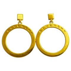 GIVENCHY signed gold tone designer runway pierced hoop dangle earrings