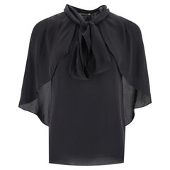 Top de seda con cuello de corbata de Givenchy