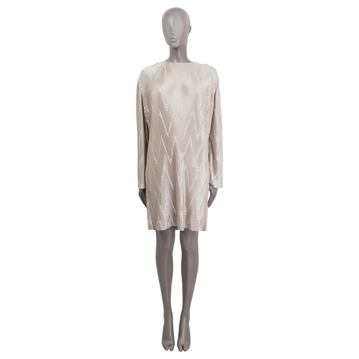 100% authentic Givenchy zig-zag plissé jersey dress in silver polyester (100%). Opens with a zipper and a hook at the shoulder. Unlined. Has been worn and is in excellent condition.

Resort 2019

Measurements
Tag Size	36
Size	XS
Shoulder Width	43cm