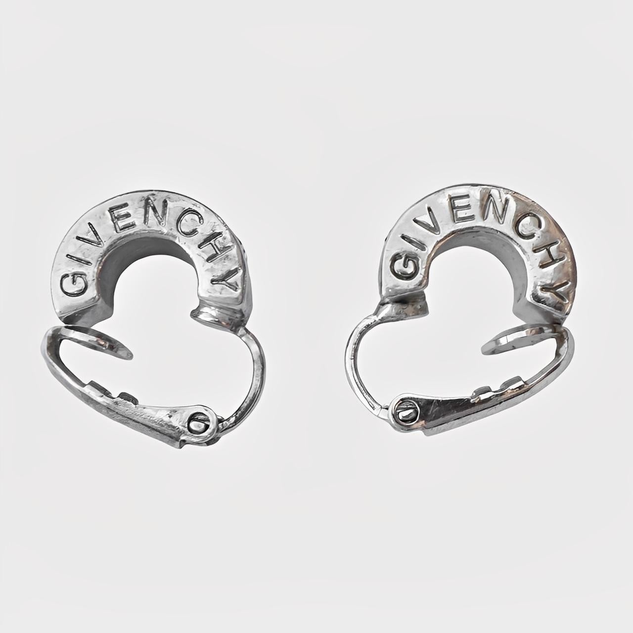 Givenchy Orecchini a clip con strass lilla placcati in argento, a metà cerchio 1