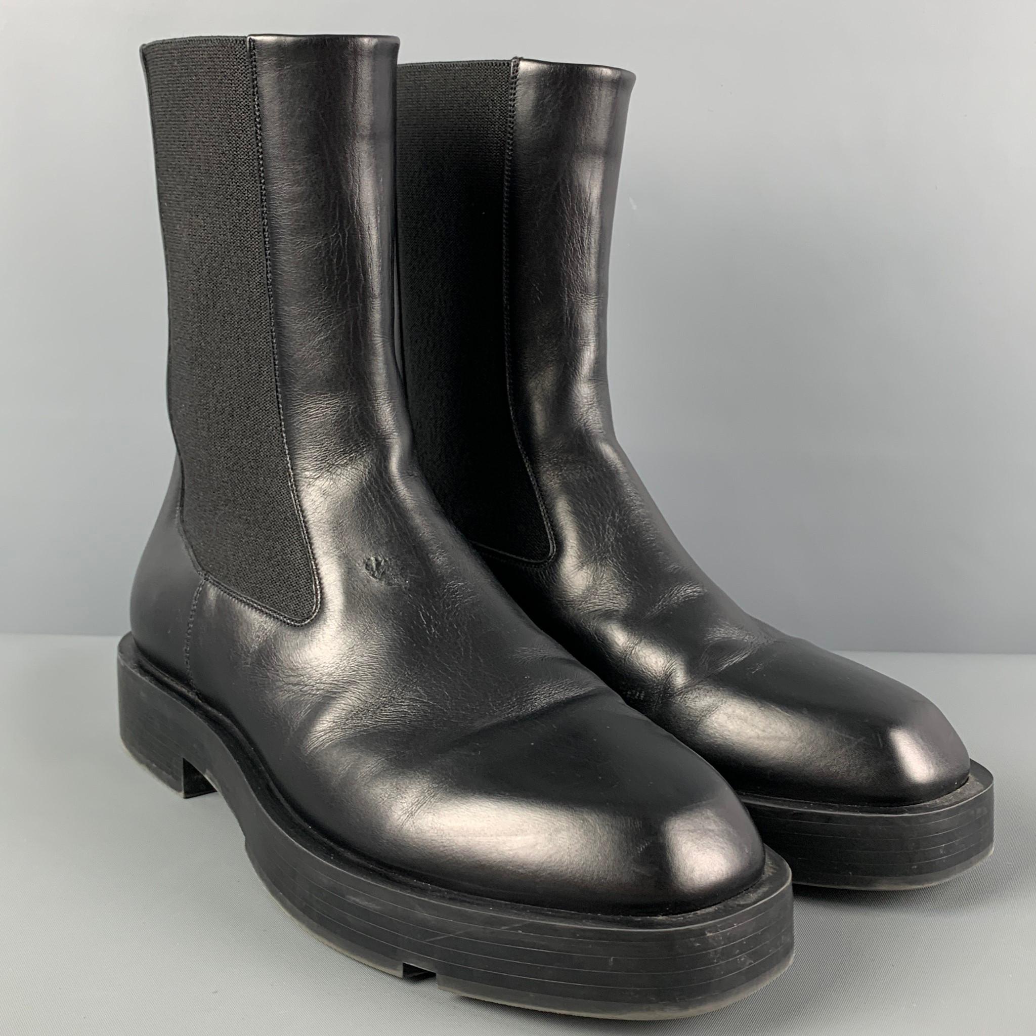 GIVENCHY boots comes in a black leather featuring a square toe, bacl metal plaque, and a chelsea style. Made in Italy. 

Very Good Pre-Owned Condition. Light wear. As-is.
Marked: SA 0231 41
Original Retail Price: $1,195.00

Measurements:

Length: