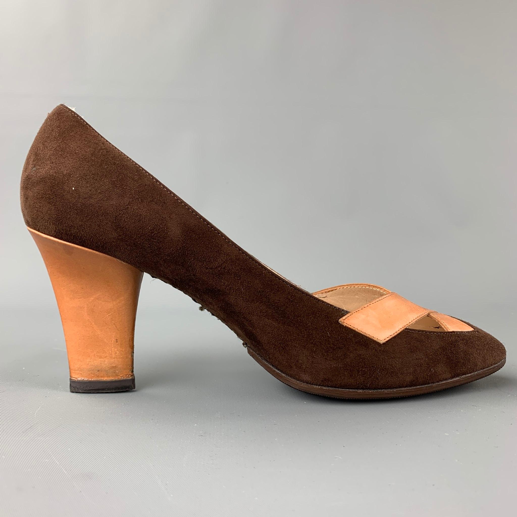 GIVENCHY pumps comes in a brown suede with a cognac criss-cross design and a cuban heel. 

Very Good Pre-Owned Condition.
Marked: No size marked

Measurements:

Heel: 3.5 in.