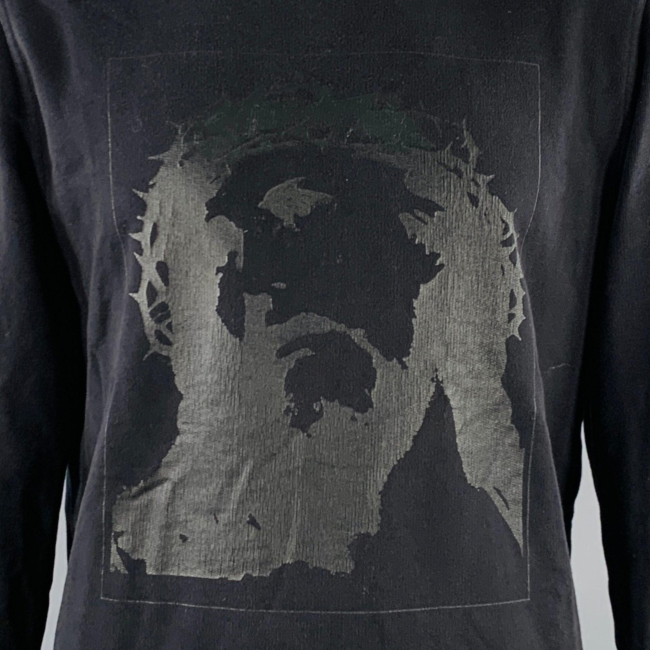 GIVENCHY sweatshirt
in a
black cotton featuring tonal Jesus print, long sleeves, and crew neck. Made in Portugal.Good Pre-Owned Condition. Multiple minor marks. 

Marked:   L 

Measurements: 
 
Shoulder: 19.5 inches  Chest: 47 inches  Sleeve: 26