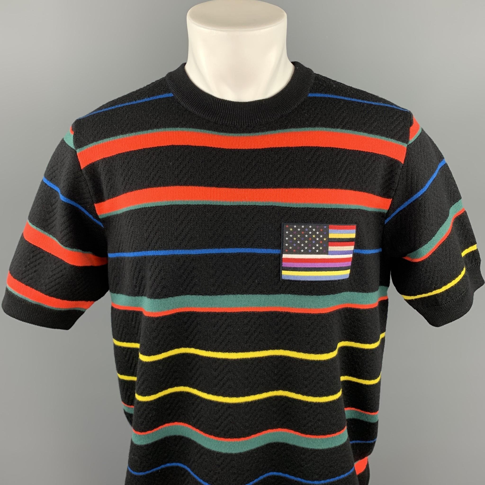 GIVENCHY short sleeve pullover comes in a black wool with a multi-color stripe print featuring a embroidered flag and a crew-neck. Made in Italy.

Excellent Pre-Owned Condition.
Marked: M

Measurements:

Shoulder: 18 in. 
Chest: 42 in. 
Sleeve: 11