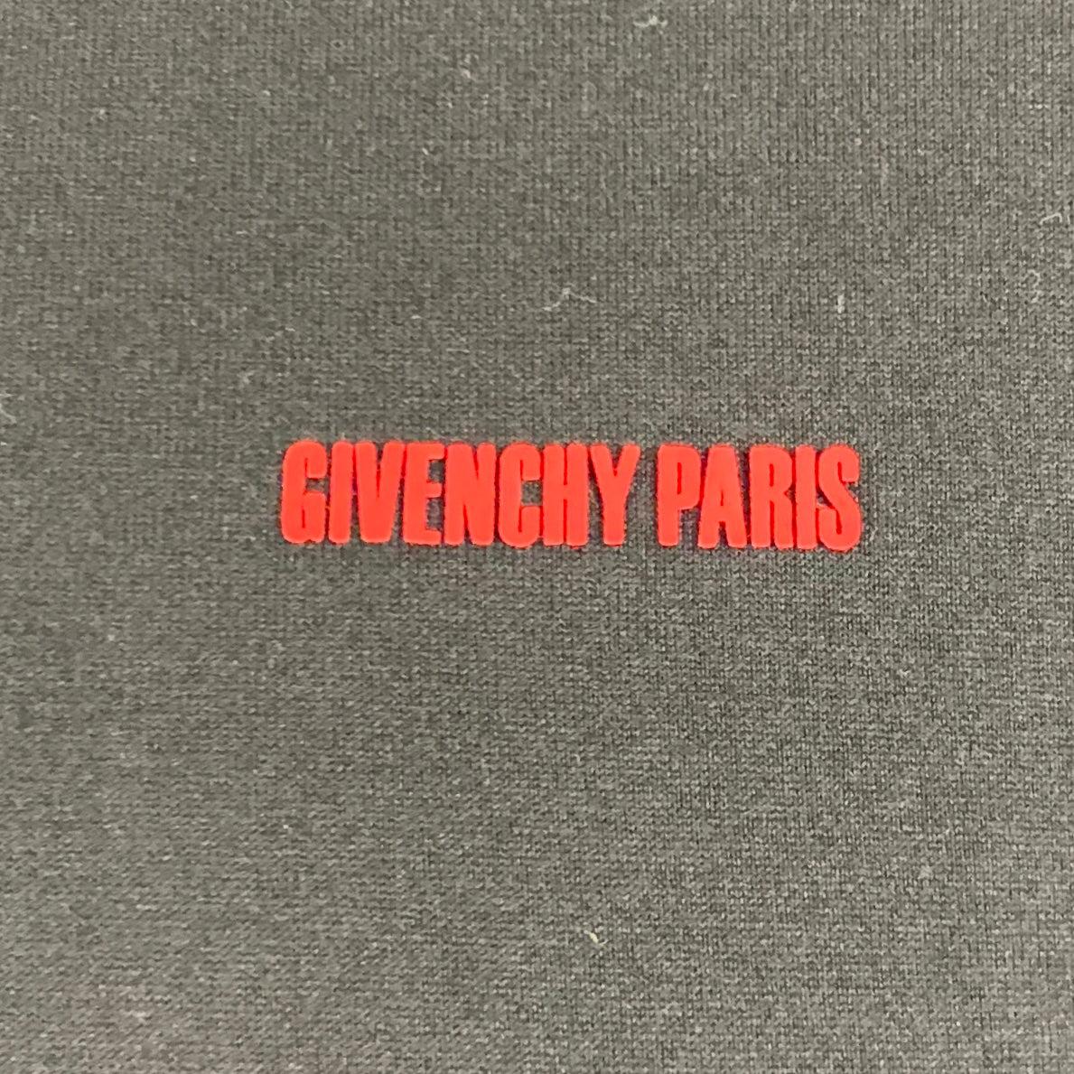 GIVENCHY long sleeve t-shirt
in a black cotton fabric featuring a casual double sleeve style, red graphic sleeves, and a crew neck. Made in Portugal.Excellent Pre-Owned Condition. 

Marked:   XL 

Measurements: 
 
Shoulder: 21.5 inches Chest: 47