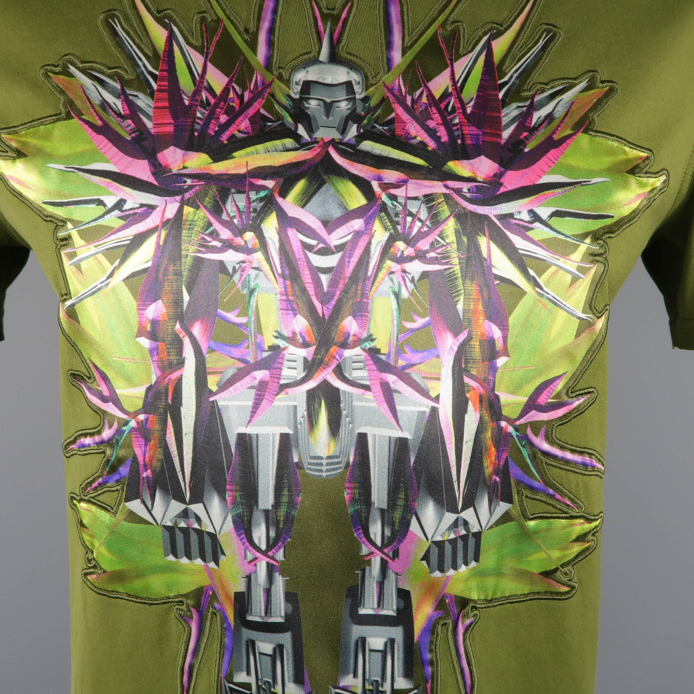 GIVENCHY Spring/Summer 2012 runway T-shirt by RICCARDO TISCI comes in olive green cotton jersey with a crewneck and abstract birds or paradise robot printed satin applique. Minor wear and discoloration by collar. As-is. Made in Portugal.
 
Fair