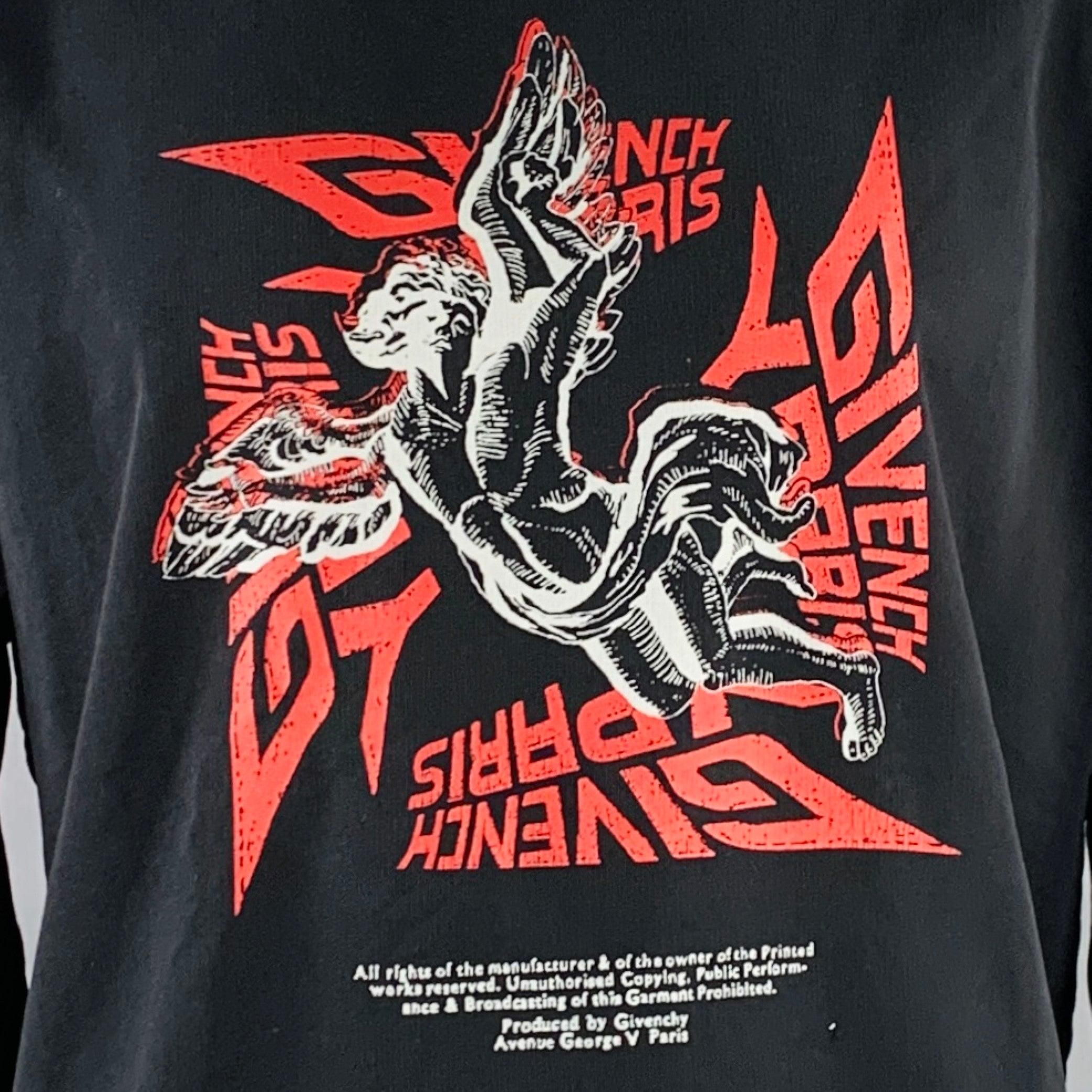 GIVENCHY PARIS sweatshirt
in a
black cotton featuring white and red angel graphic on front and back, distressed details under arms, and crew neck. Made in Portugal.Very Good Pre-Owned Condition.
Minor signs of wear. 

Marked:   XXL 

Measurements: 
