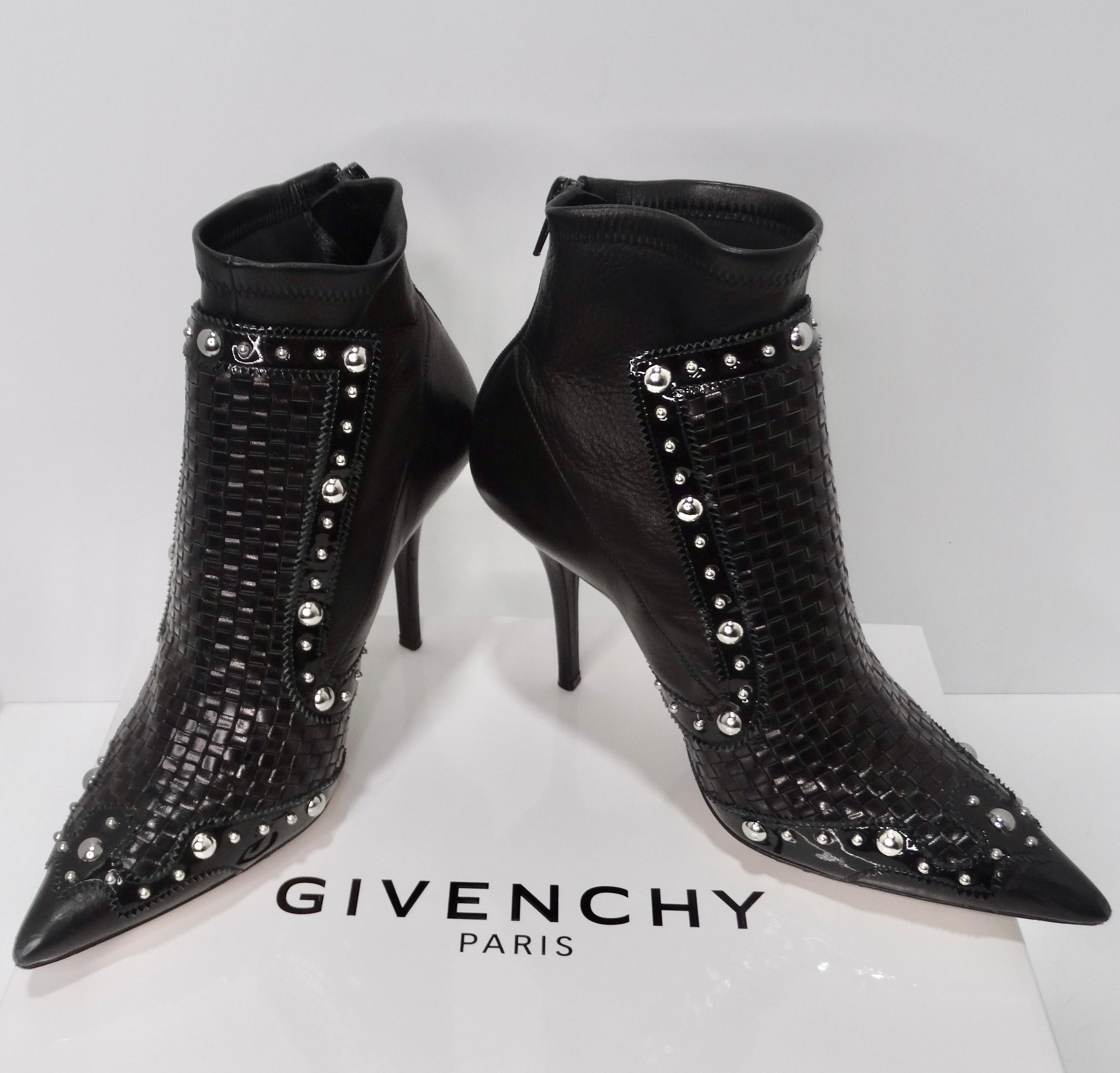Get your hands on the Givenchy Studded Iron Ankle Boots, a fusion of classic elegance and edgy style that will instantly elevate your footwear game. These ankle booties boast a classic and timeless silhouette, featuring a pointed toe and a high