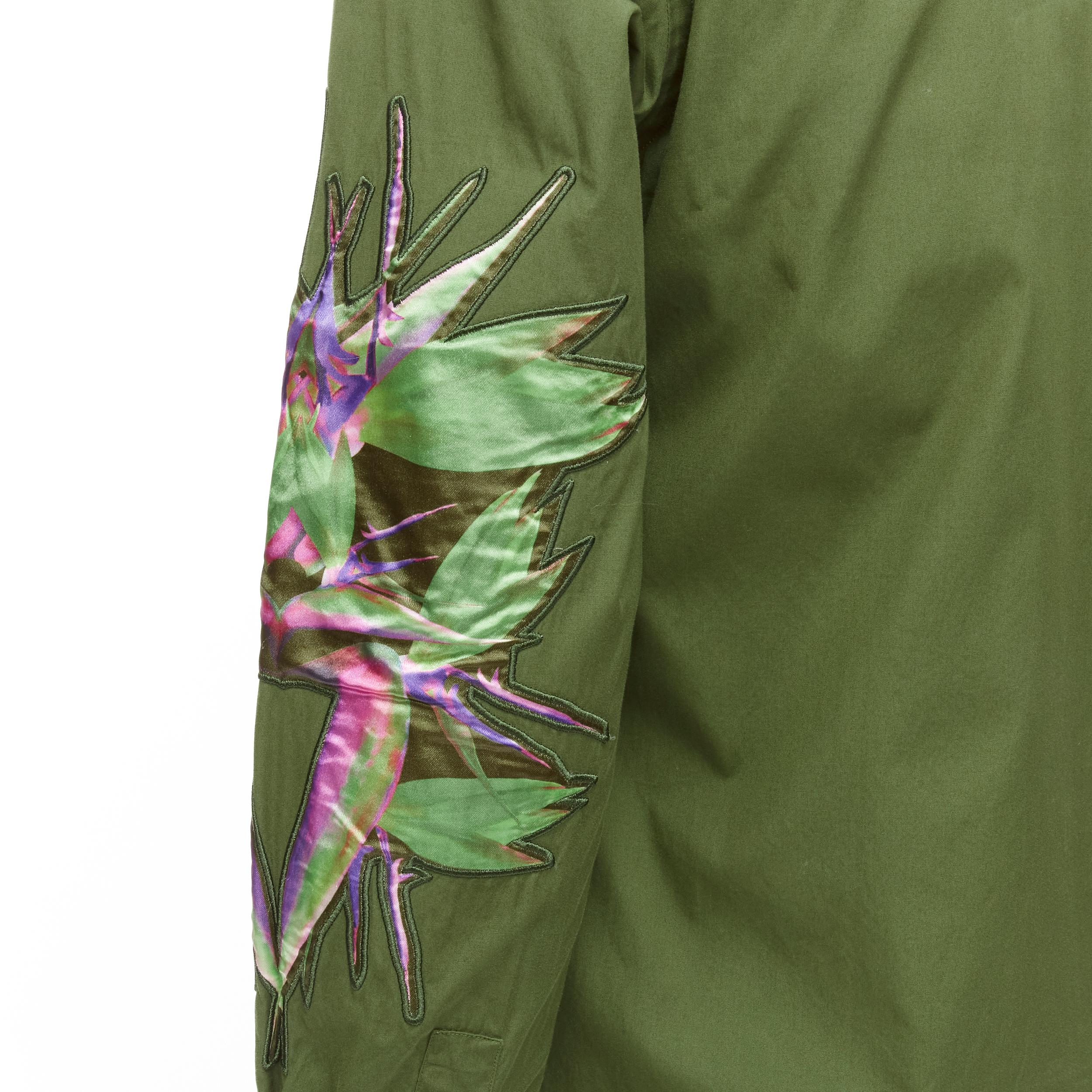 GIVENCHY Tisci 2012 green cotton Birds of Paradise patch sleeve shirt S 
Reference: TGAS/C00147 
Brand: Givenchy 
Designer: Riccardo Tisci 
Material: Cotton 
Color: Green 
Pattern: Floral 
Closure: Button 
Extra Detail: Birds of Paradise polyester