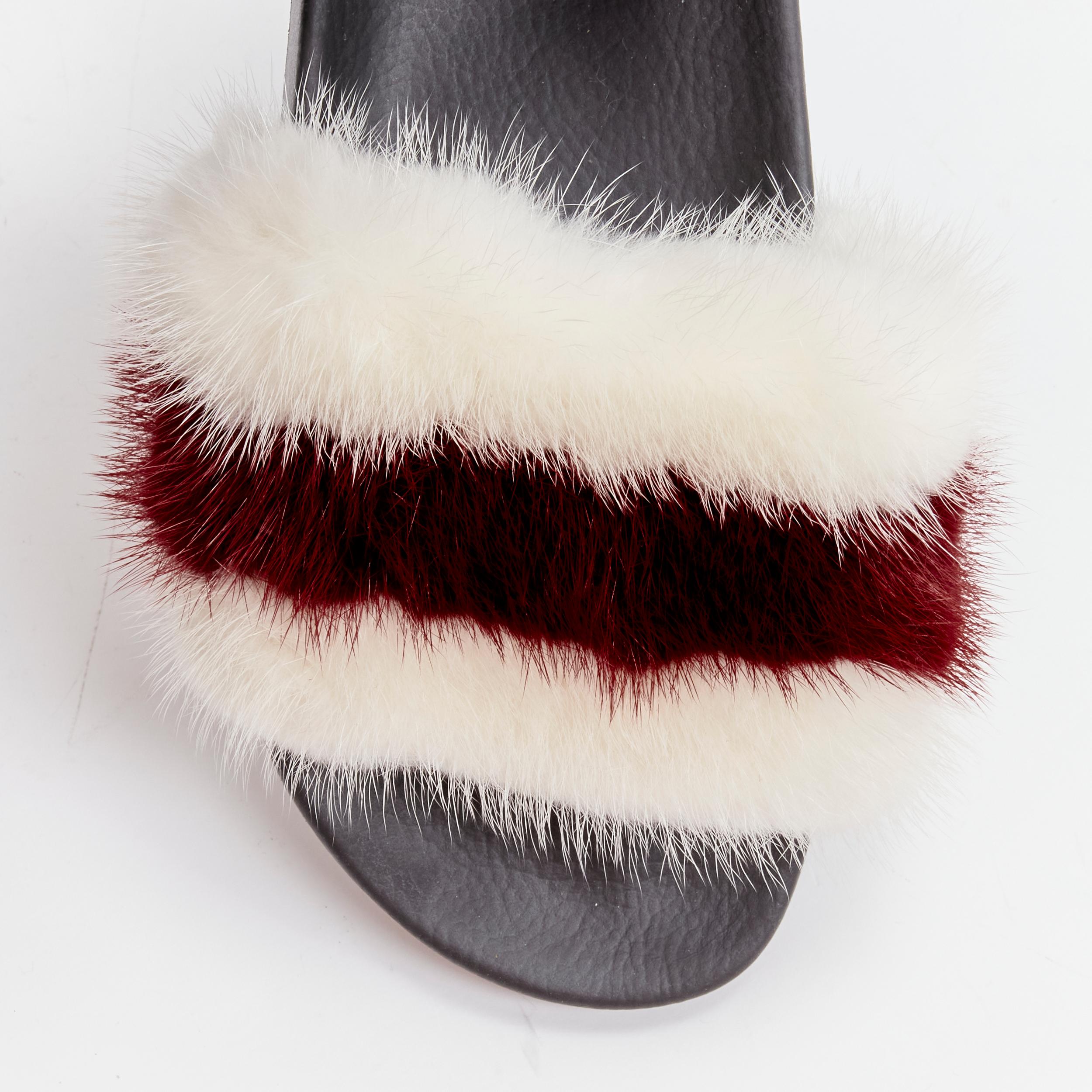 GIVENCHY Tisci schwarze Pool slides mit rot-weißen Streifen und geprägtem Logo aus Fuchspelz EU38 im Angebot 1
