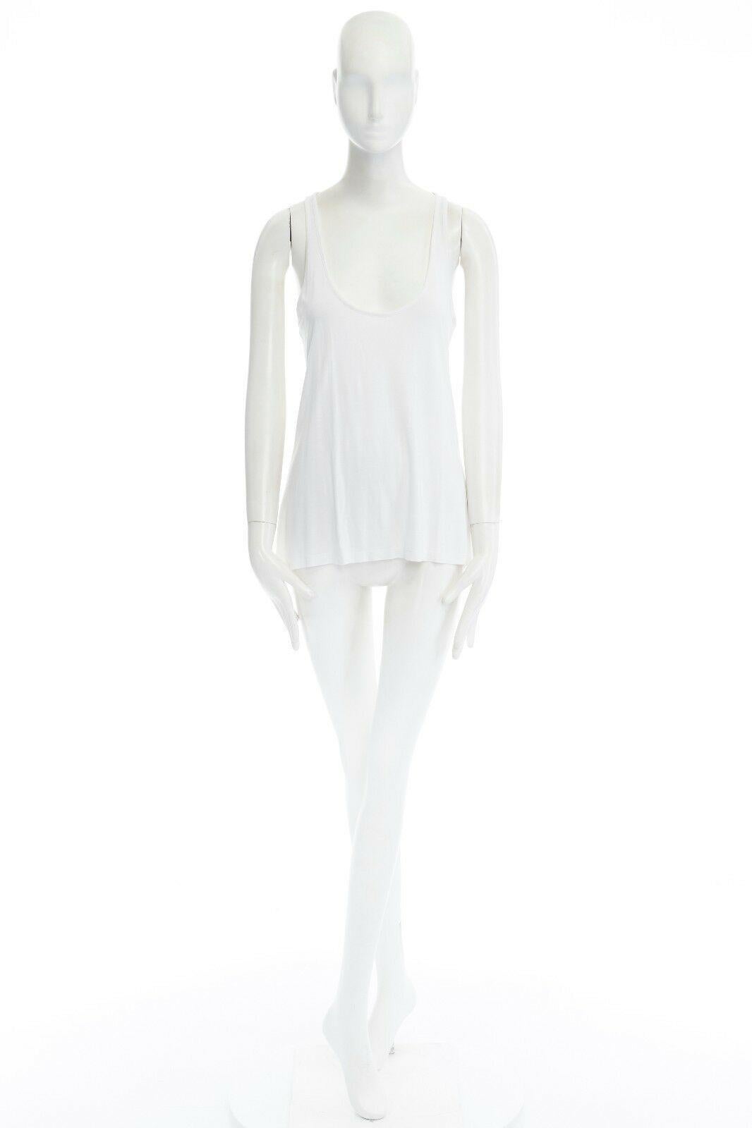 GIVENCHY TISCI white viscose silk white scoop neck tank top S 
Reference: LNKO/A00616 
Brand: Givenchy 
Designer: Riccardo Tisci 
Material: Viscose 
Color: White 
Pattern: Solid 
Extra Detail: Viscose, silk. Simple tank top. Scoop neckline.