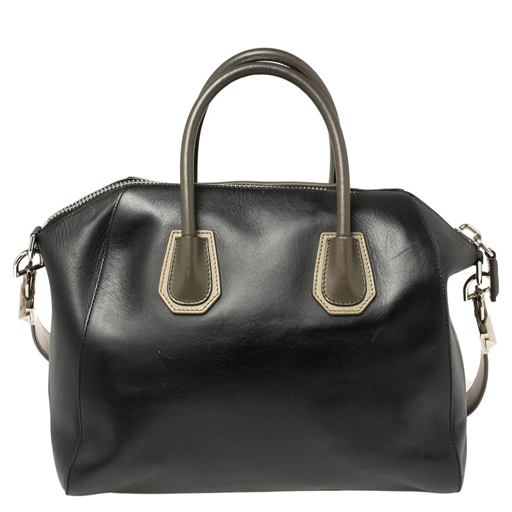Made in Italy, and loved by women worldwide is this beautiful Antigona satchel by Givenchy. It has been crafted from leather and shaped elegantly. The bag has a top zipper that reveals a fabric interior and it is held by two top handles and a