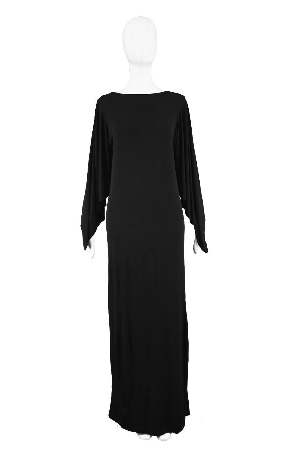 Givenchy Vintage 1970s Nouvelle Boutique Black Jersey Maxi Column Dress

Estimated Size: UK 12-14/ US 8-10/ EU 40-42. Please check measurements 
Bust - 38” / 96cm 
Waist - 34” / 86cm (meant to have a loose fit)
Hips - 42” / 106cm
Length (Shoulder to