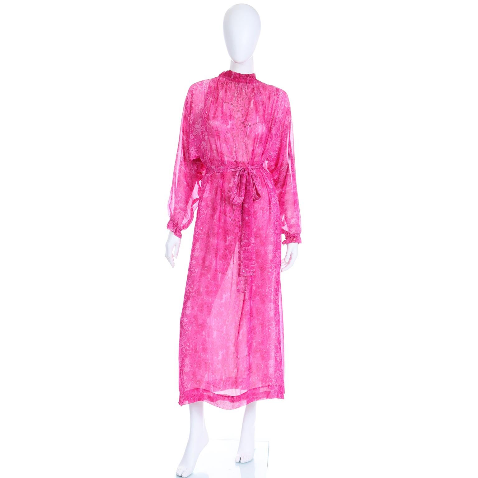 This incredible vintage Givenchy dress is beautiful in person. The dress is in a watercolor abstract floral print fine, sheer silk. We love dresses like these because they can be worn in the day or accessorized to be worn in the evening!

We