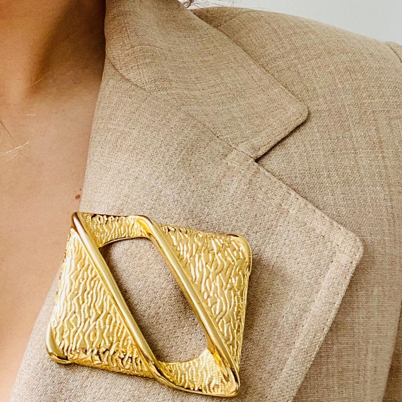 Givenchy Vintage 1980s Brooch

Incredible statement brooch from the iconic House of Hubert de Givenchy. Made in the US in the 1980s, this incredible brooch is cast from high quality gold plated metal. Guaranteed to elevate your favourite blazers and