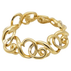 Givenchy, grand bracelet en or épais vintage des années 1980, avec deux maillons entrelacés en forme de G