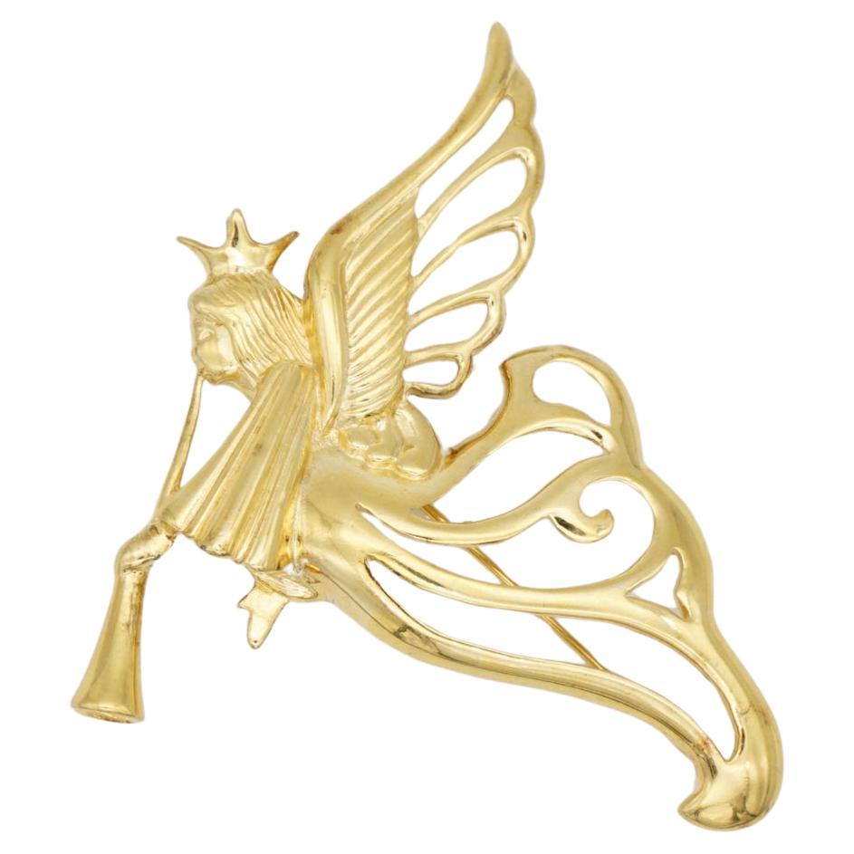 Givenchy, grande broche trompette ajourée avec ailes volantes et ange du ciel, vintage des années 1980 en vente