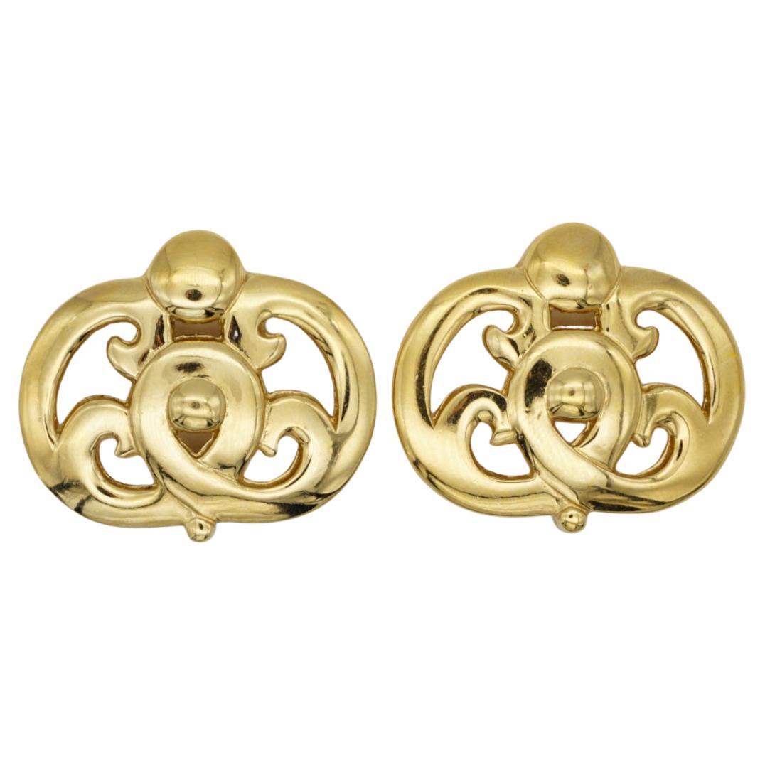 Givenchy Vintage 1980s Large Openwork Sculpted Hollow Gold Oval Clip Earrings For Sale