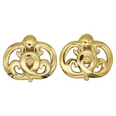 Givenchy Vintage 1980s Large Openwork Sculpted Hollow Gold Oval Clip Earrings