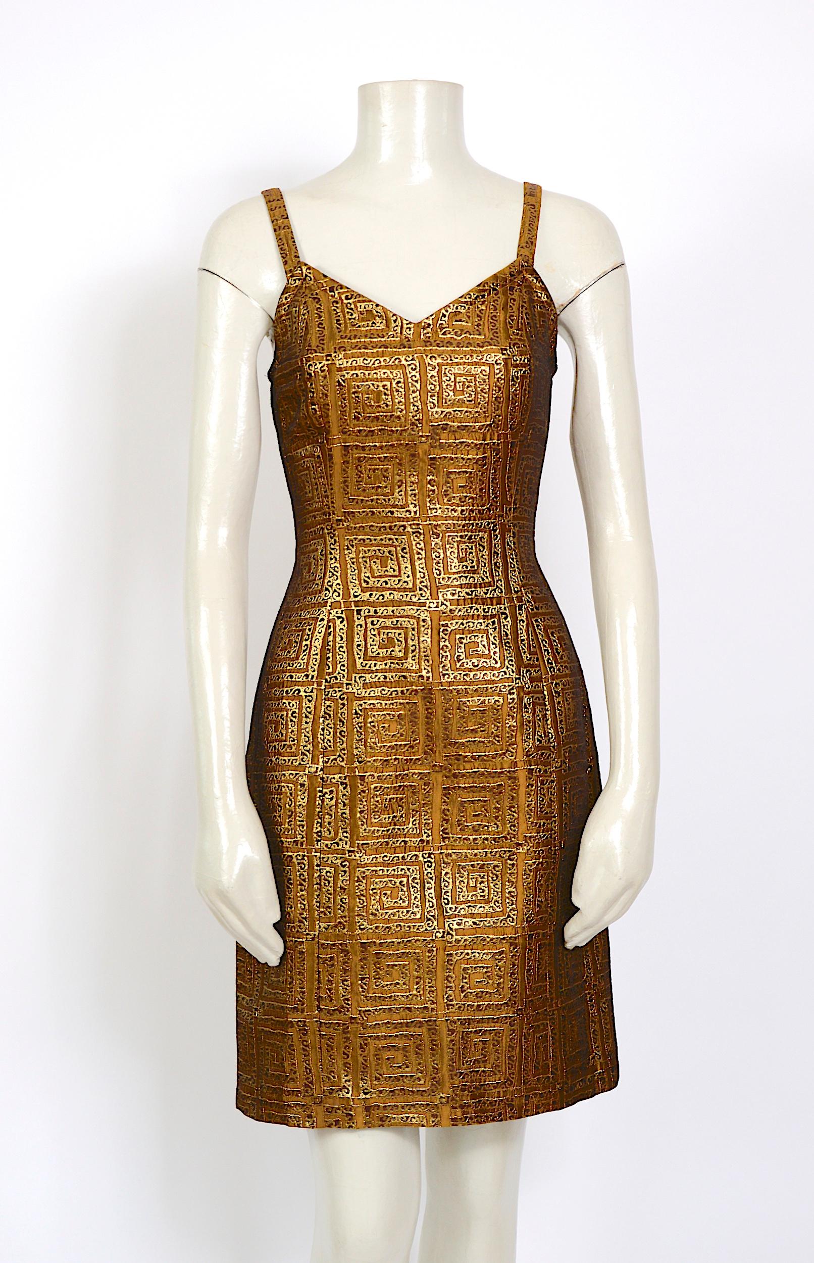 Givenchy vintage gold logo dress that dates from the 90s or 80s 
Fully lined. 
Made in France
Excellent condition 
Closes at the back with a zipping. The fabric is a mix of metal - viscose, and polyester
There is no size label, and we fitted the
