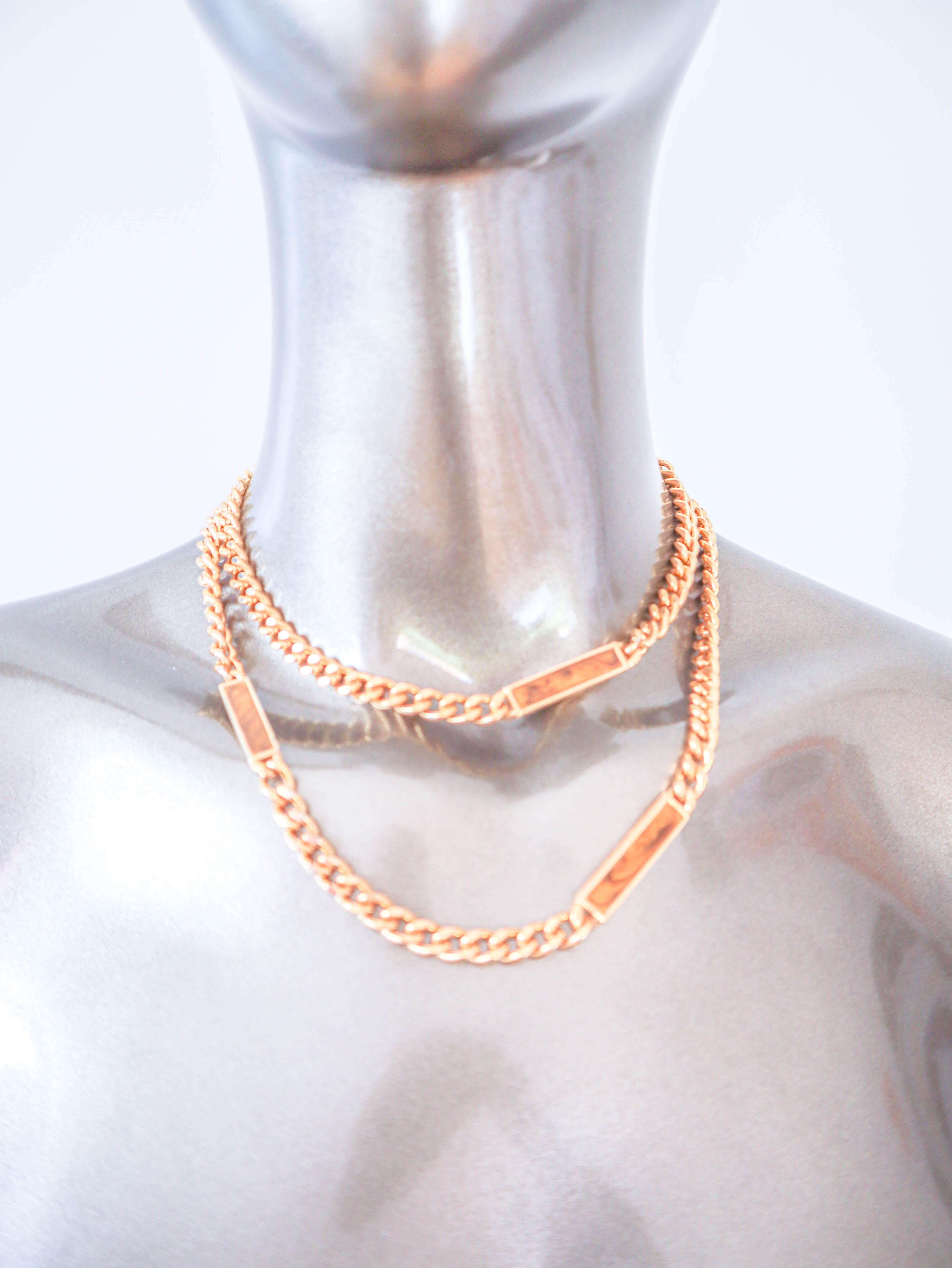 1980's Givenchy enamel necklace with unique marble print amber, this extra long necklace could be worn multiple ways and easy to mix and match with your outfit.
Feature
Material: Metal & Enamel
Color: Gold
Condition: Excellent
Period: