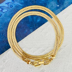 Collier Givenchy Vintage Gold unisexe à maillons longs entrelacés, motif serpent et maillons en chaîne