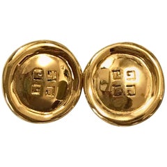 Givenchy Vintage golden round shape earrings with embossed logo mark