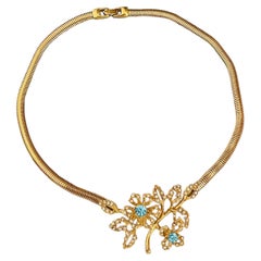 Collier Givenchy Vintage Iconic en or, grand modèle, bleu aqua, avec motif de feuilles, fleurs et serpent