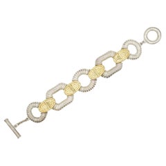 Givenchy Bracelet vintage iconique à maillons emboîtés en argent et or avec logo et monogramme