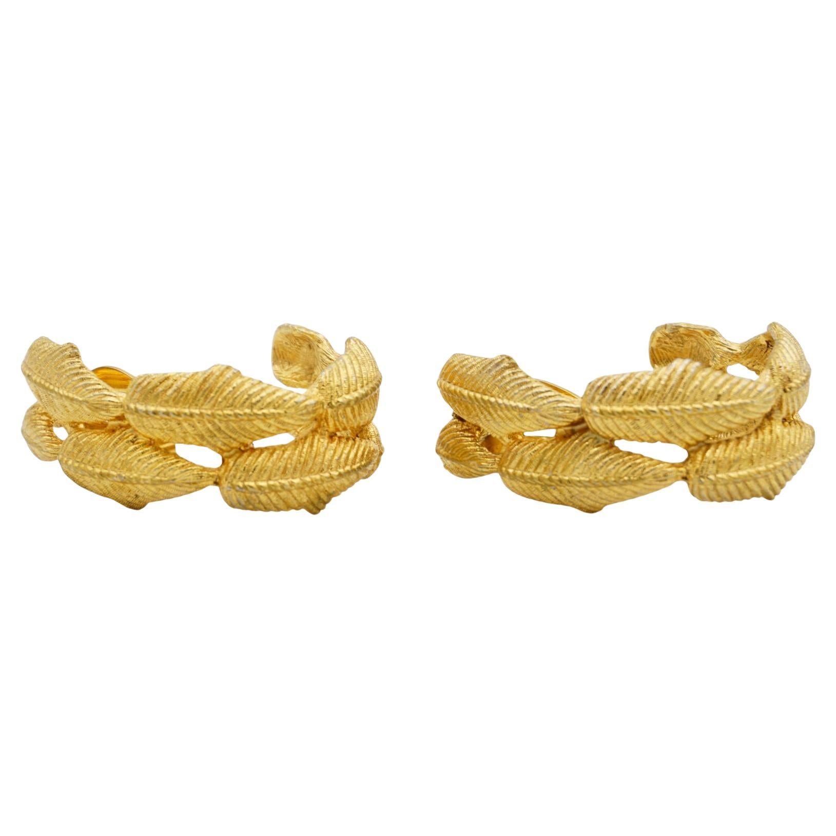 Givenchy Vintage 1980s Massive Large Vivid Double Leaf Openwork Circle Hoop Dome Chunky Statement Modernist Clip Earrings, Gold Plated

Very good condition. Some light scratches or colour loss. 100% Genuine.

Givenchy Signed clearly on the reverse.