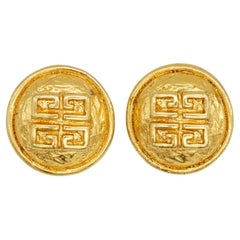 Givenchy, grandes boucles d'oreilles vintage texturées avec grand logo 4G et monogramme en relief rond