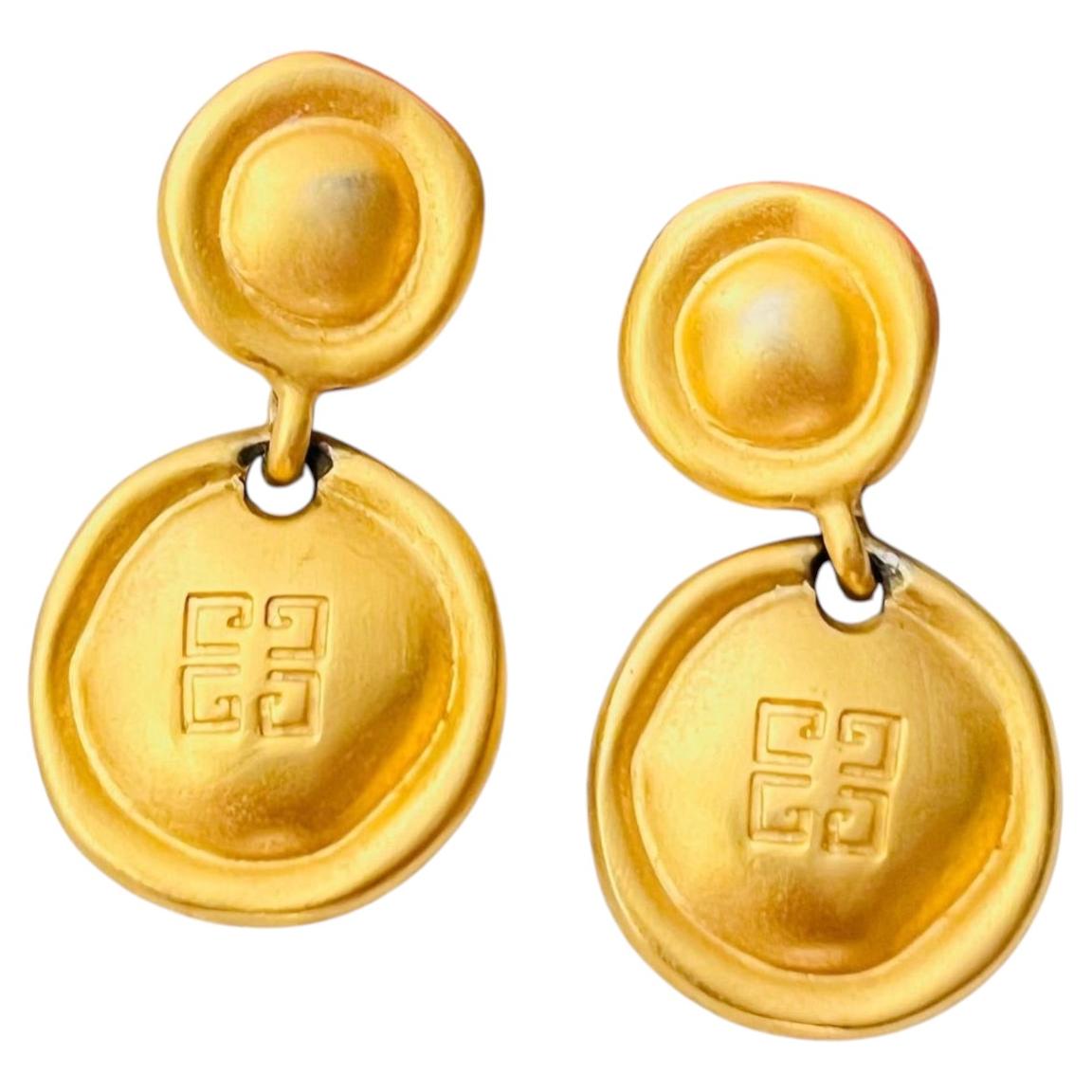 Orecchini pendenti Givenchy Vintage unisex, iconici e rari, con 4G bottoni in oro opaco e design traforato