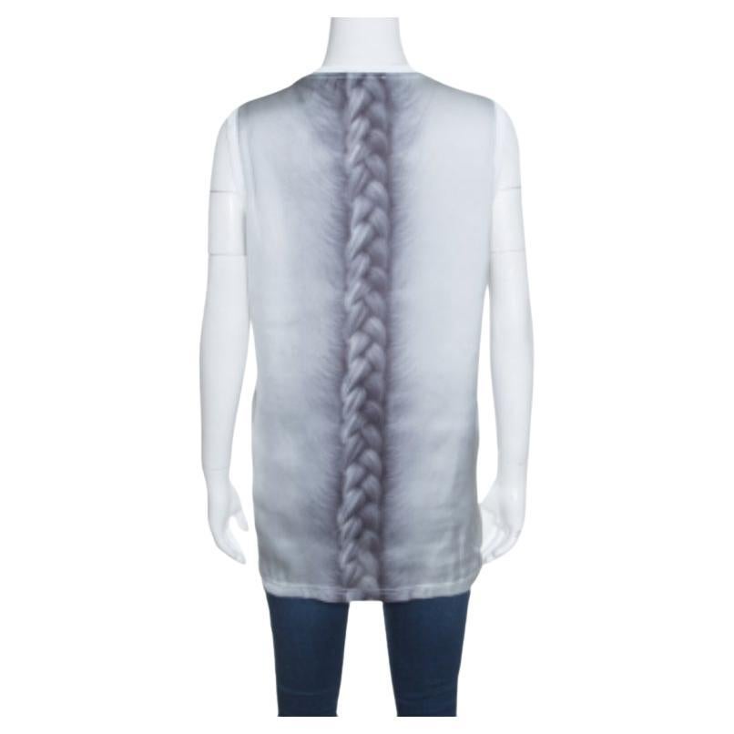 With that cool braid print at the rear and subtle round neckline, this t-shirt from the French luxury fashion house, Givenchy looks good with everything. White in color, it is made of lightweight cotton into a sleeveless design.